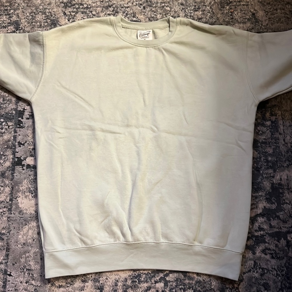 Woman’s Teal crew neck